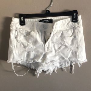 Ripped white jean shorts